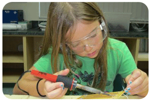 Girl soldering
